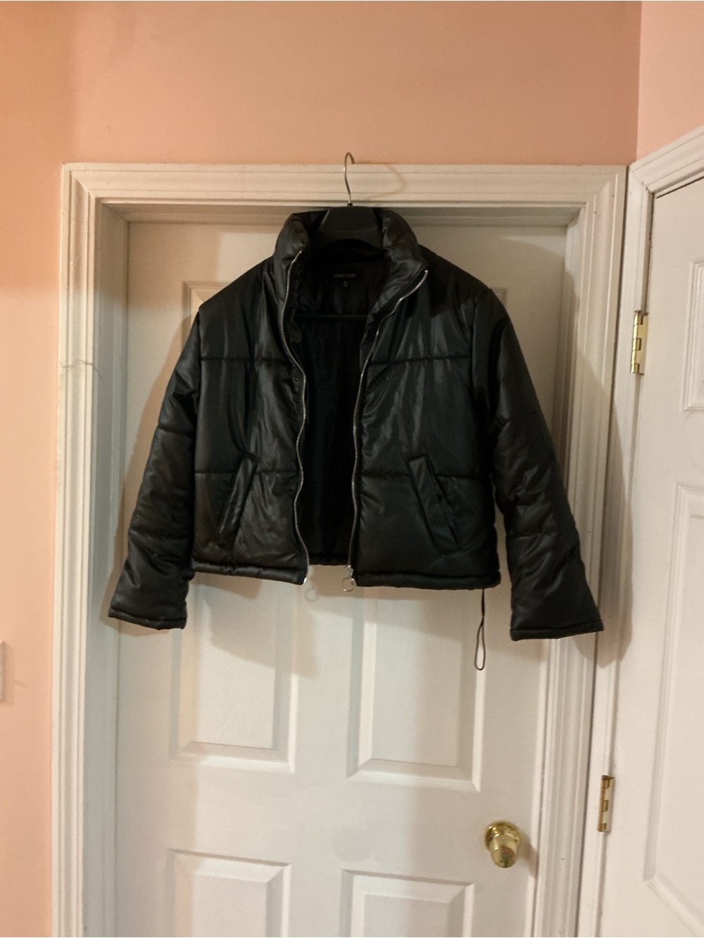 Beautiful women’s black leather like puffer jacket excellent condition